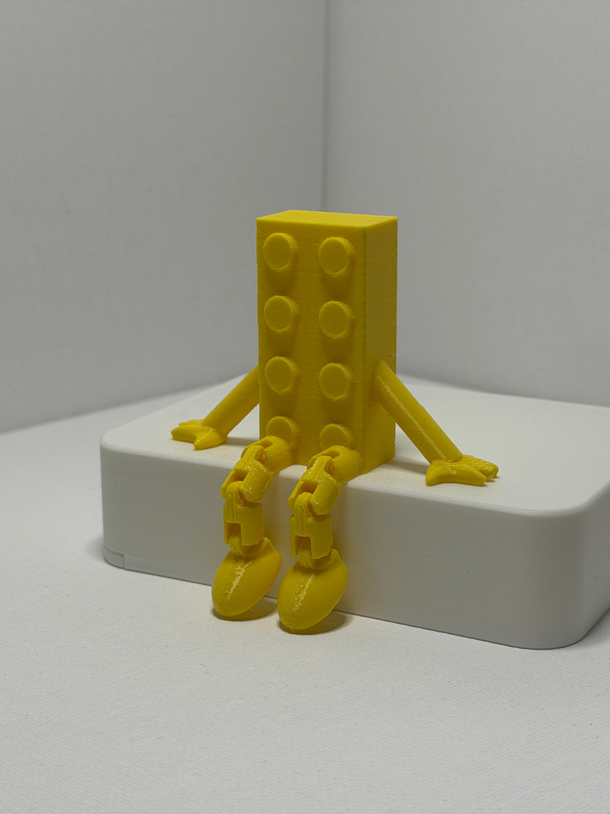 Brick Buddy – Yellow-Articulated 3D Printed Character